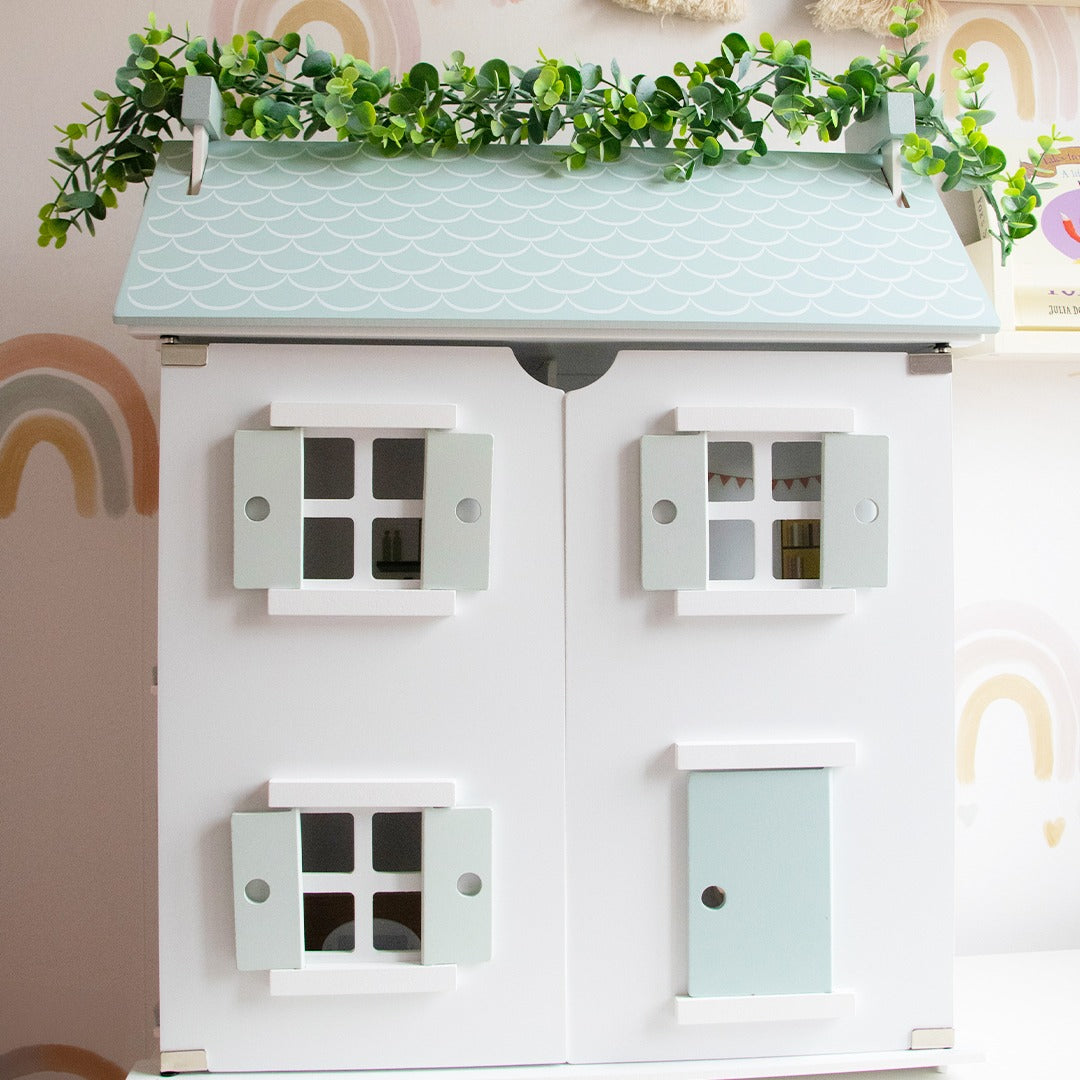 Barnshenn wooden dolls house featuring intricate details, perfect for fostering imaginative play and creativity in children