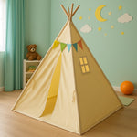 Yellow play teepee tent with colorful bunting in a cozy kids' room featuring green curtains, teddy bear, and moon wall decor.